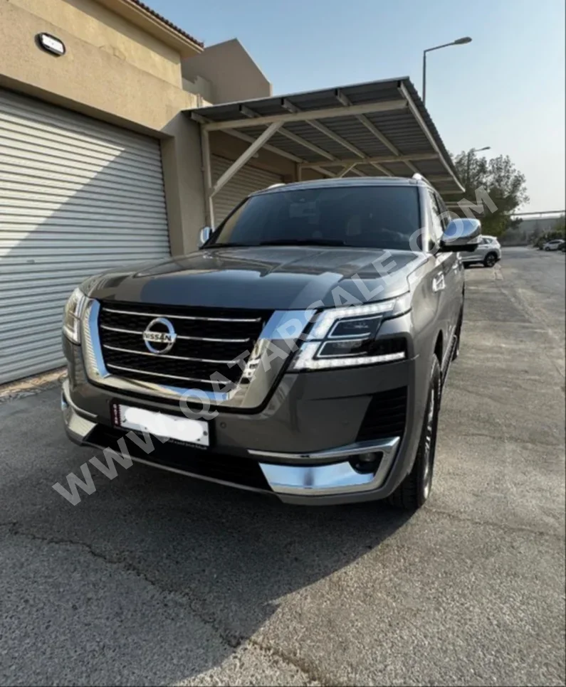 Nissan  Patrol  Platinum  2021  Automatic  24,000 Km  6 Cylinder  All Wheel Drive (AWD)  SUV  Dark Gray