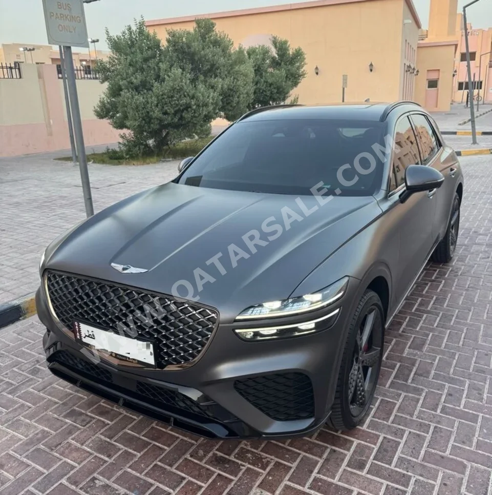Genesis  GV 70  2023  Automatic  34,000 Km  6 Cylinder  All Wheel Drive (AWD)  SUV  Gray Matte  With Warranty