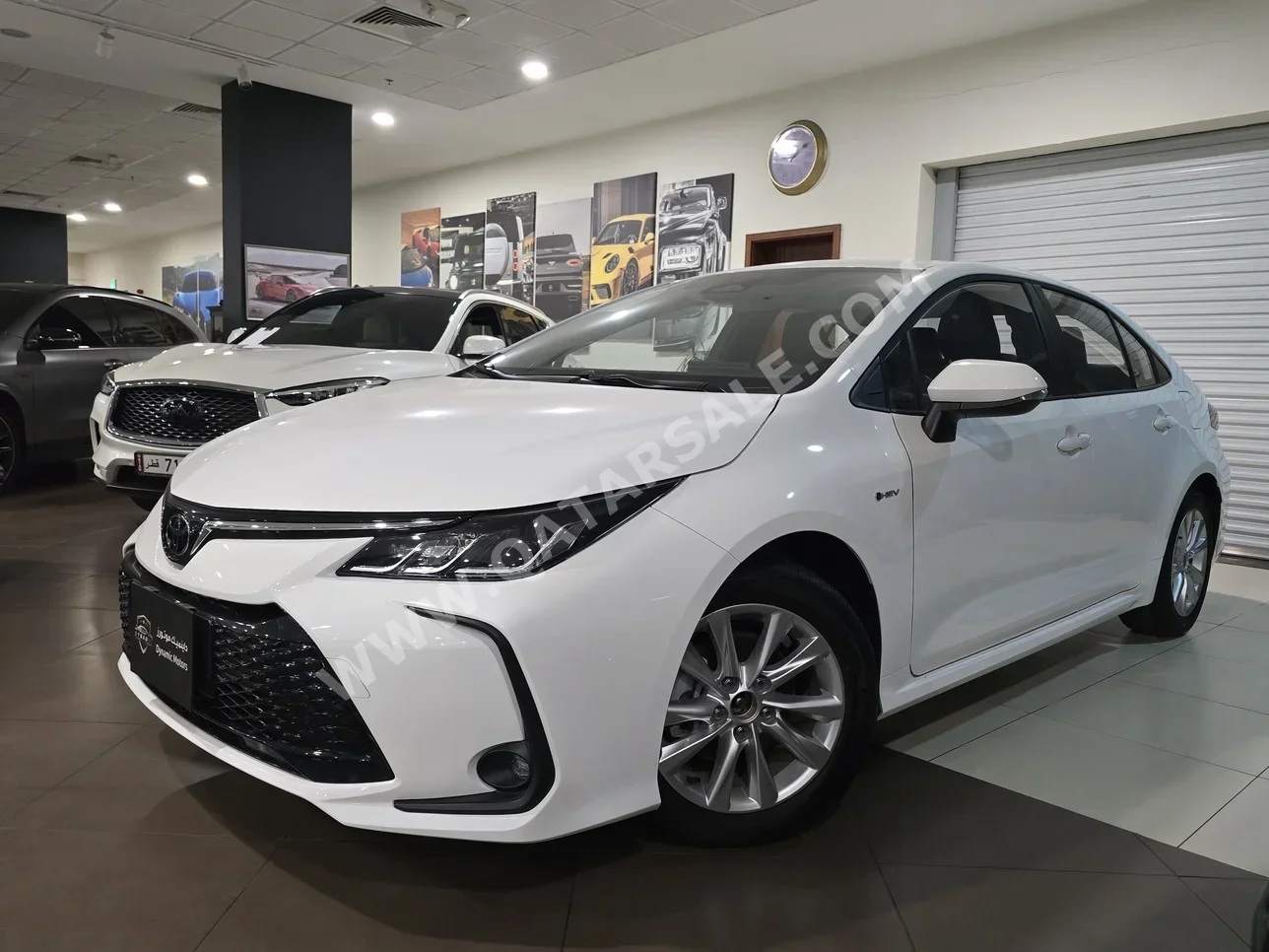Toyota  Corolla  Hybrid  2025  Automatic  0 Km  4 Cylinder  Front Wheel Drive (FWD)  Sedan  White  With Warranty