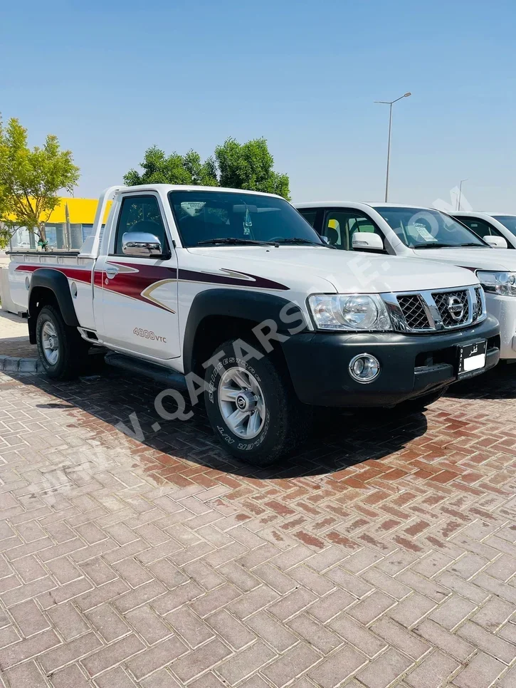 نيسان  باترول  بيك اب  2023  عادي  19,000 كم  6 سلندر  دفع رباعي  بيكب  أبيض  تحت الضمان