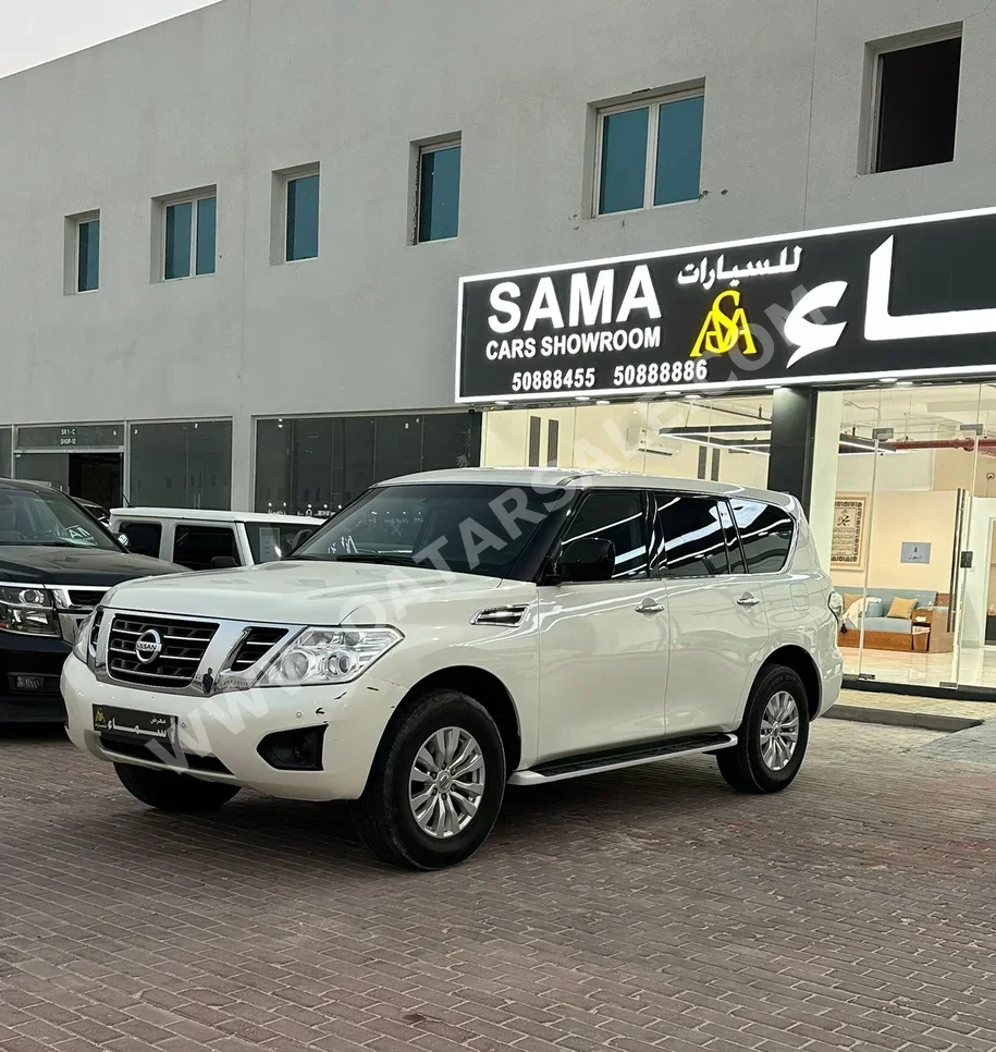 Nissan  Patrol  XE  2017  Automatic  220,000 Km  6 Cylinder  Four Wheel Drive (4WD)  SUV  White