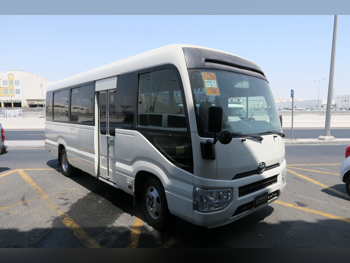 Toyota  Coaster  2020  Manual  236,000 Km  4 Cylinder  Rear Wheel Drive (RWD)  Van / Bus  White