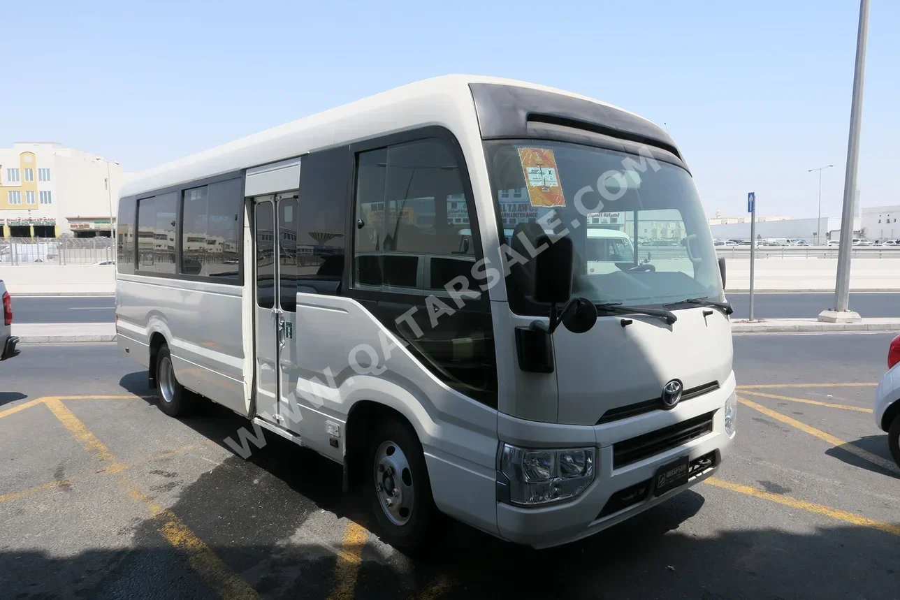 Toyota  Coaster  2020  Manual  236,000 Km  4 Cylinder  Rear Wheel Drive (RWD)  Van / Bus  White