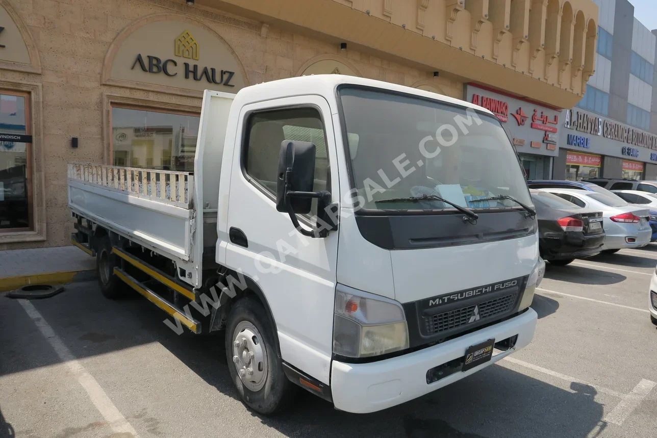 Mitsubishi  Fuso Canter  2014  Manual  400,000 Km  4 Cylinder  Rear Wheel Drive (RWD)  Pick Up  White