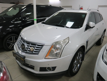 Cadillac  SRX  2016  Automatic  71,000 Km  6 Cylinder  Four Wheel Drive (4WD)  SUV  White