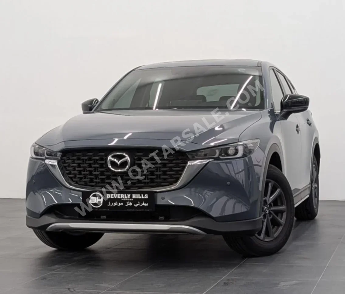 Mazda  CX  5  2025  Automatic  6,500 Km  4 Cylinder  All Wheel Drive (AWD)  SUV  Gray  With Warranty