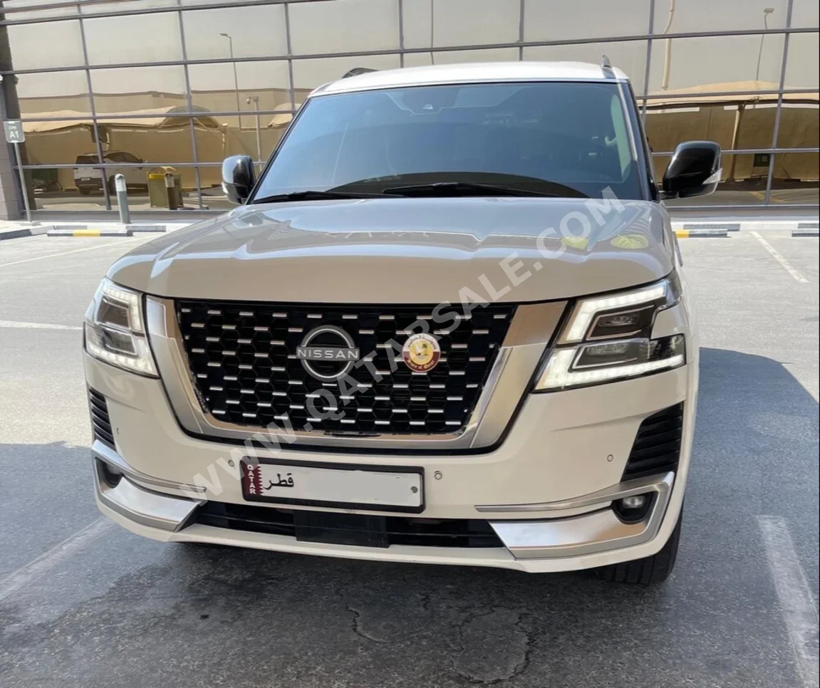 Nissan  Patrol  Titanium  2020  Automatic  280,000 Km  6 Cylinder  Four Wheel Drive (4WD)  SUV  Pearl