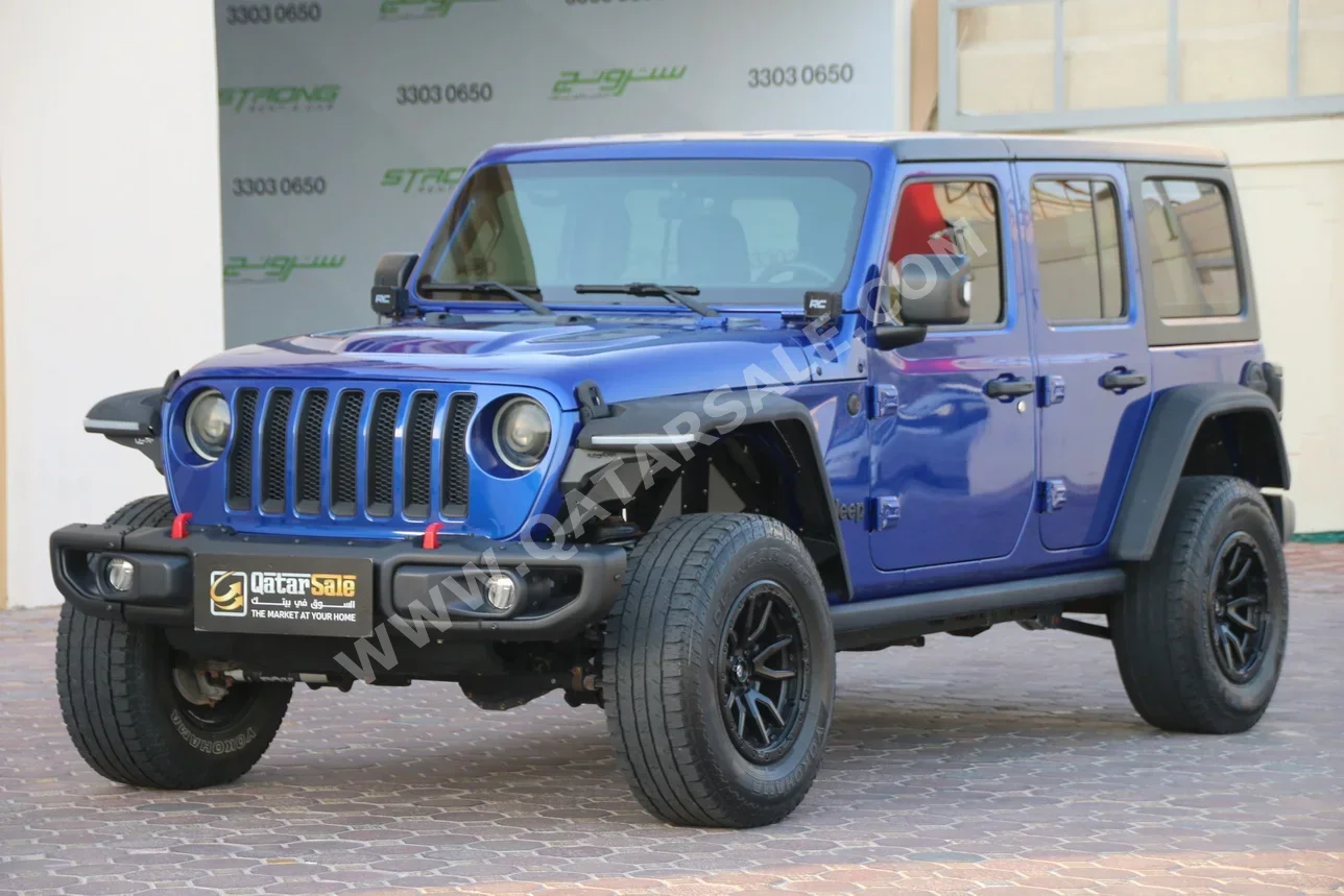 Jeep  Wrangler  Sport  2020  Automatic  100,000 Km  6 Cylinder  Four Wheel Drive (4WD)  Convertible  Dark Blue