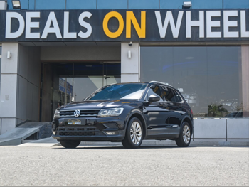 Volkswagen  Tiguan  2.0 TSI  2018  Automatic  140,000 Km  4 Cylinder  All Wheel Drive (AWD)  SUV  Black