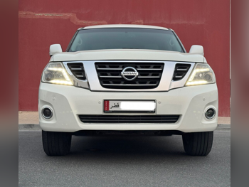 Nissan  Patrol  SE  2014  Automatic  240,000 Km  8 Cylinder  Four Wheel Drive (4WD)  SUV  White