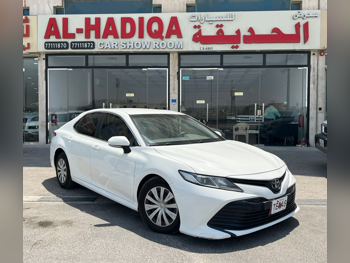 Toyota  Camry  LE  2018  Automatic  170,000 Km  4 Cylinder  Front Wheel Drive (FWD)  Sedan  White