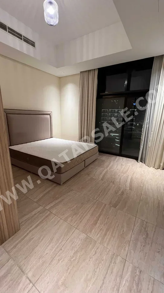 2 Bedrooms  Apartment  For Rent  in Doha -  The Pearl  Fully Furnished