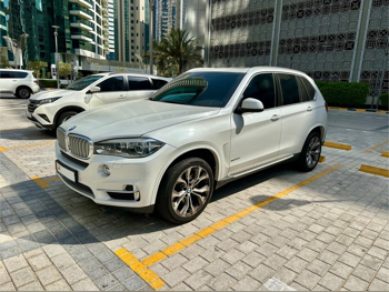 BMW  X-Series  X5 XDrive 50i  2016  Tiptronic  124,500 Km  8 Cylinder  All Wheel Drive (AWD)  SUV  White