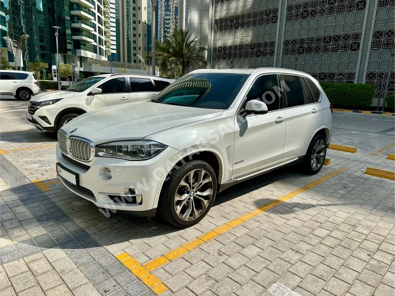 BMW  X-Series  X5 XDrive 50i  2016  Tiptronic  124,500 Km  8 Cylinder  All Wheel Drive (AWD)  SUV  White