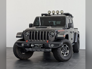 Jeep  Gladiator  Sand Runner  2021  Automatic  27,300 Km  6 Cylinder  All Wheel Drive (AWD)  Pick Up  Gray  With Warranty