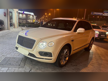 Bentley  Bentayga  First Edition  2017  Automatic  17,773 Km  12 Cylinder  Four Wheel Drive (4WD)  SUV  Beige  With Warranty