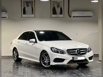 Mercedes-Benz  E-Class  300  2014  Automatic  211,000 Km  6 Cylinder  Rear Wheel Drive (RWD)  Sedan  White