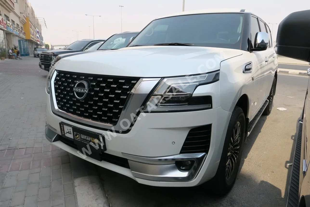 Nissan  Patrol  XE  2020  Automatic  126,000 Km  6 Cylinder  Four Wheel Drive (4WD)  SUV  White
