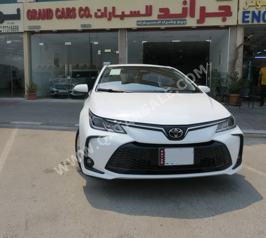 Toyota  Corolla  Hybrid  2025  Automatic  0 Km  4 Cylinder  Front Wheel Drive (FWD)  Sedan  White