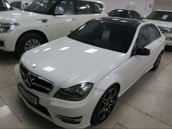 Mercedes-Benz  C-Class  200  2014  Automatic  143,000 Km  4 Cylinder  Rear Wheel Drive (RWD)  Sedan  White