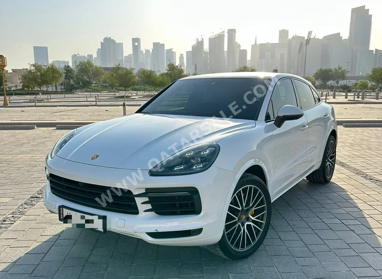 بورش  كيان  كوبيه  2021  اوتوماتيك  66,000 كم  6 سلندر  دفع رباعي  اس يو في  أبيض  تحت الضمان