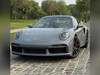Porsche  911  Turbo  2024  Automatic  4,700 Km  6 Cylinder  All Wheel Drive (AWD)  Coupe / Sport  Gray  With Warranty