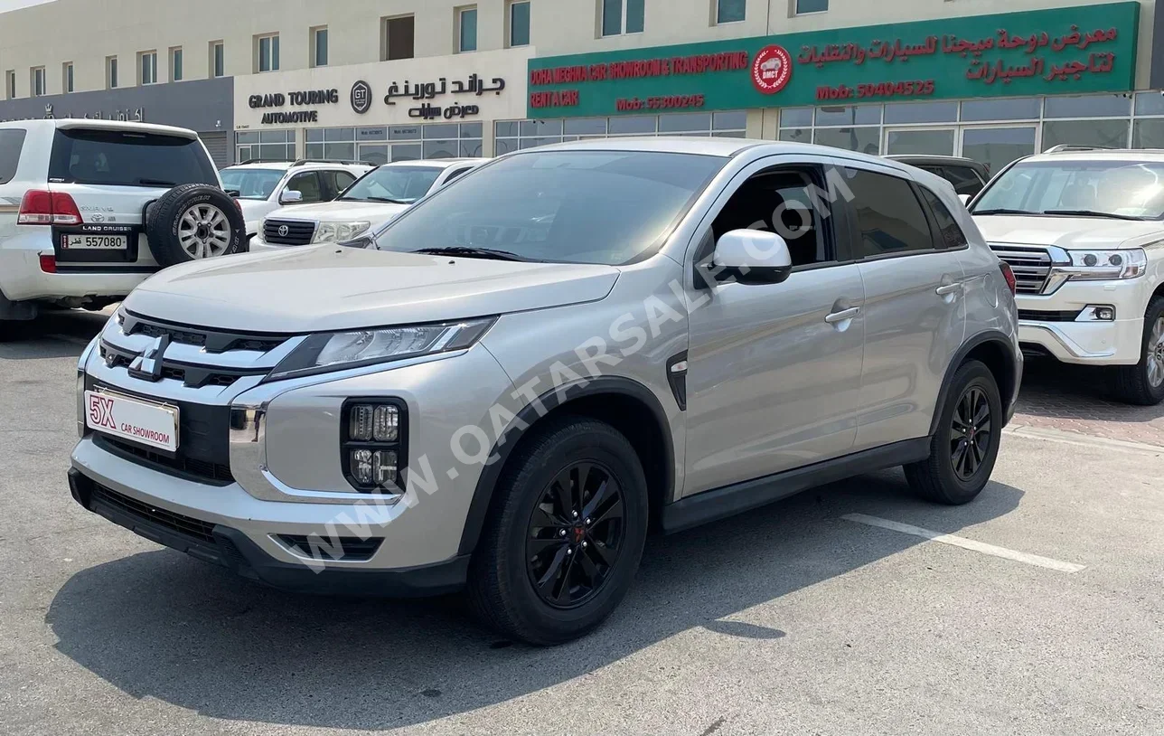 Mitsubishi  ASX  2023  Automatic  48,000 Km  4 Cylinder  Front Wheel Drive (FWD)  SUV  Silver  With Warranty