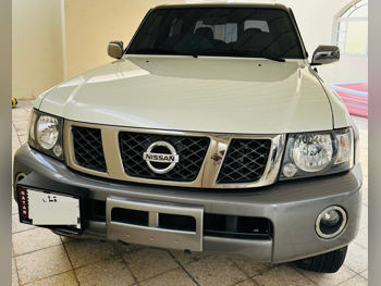 Nissan  Patrol  Super Safari  2022  Manual  27,000 Km  6 Cylinder  Four Wheel Drive (4WD)  SUV  White  With Warranty