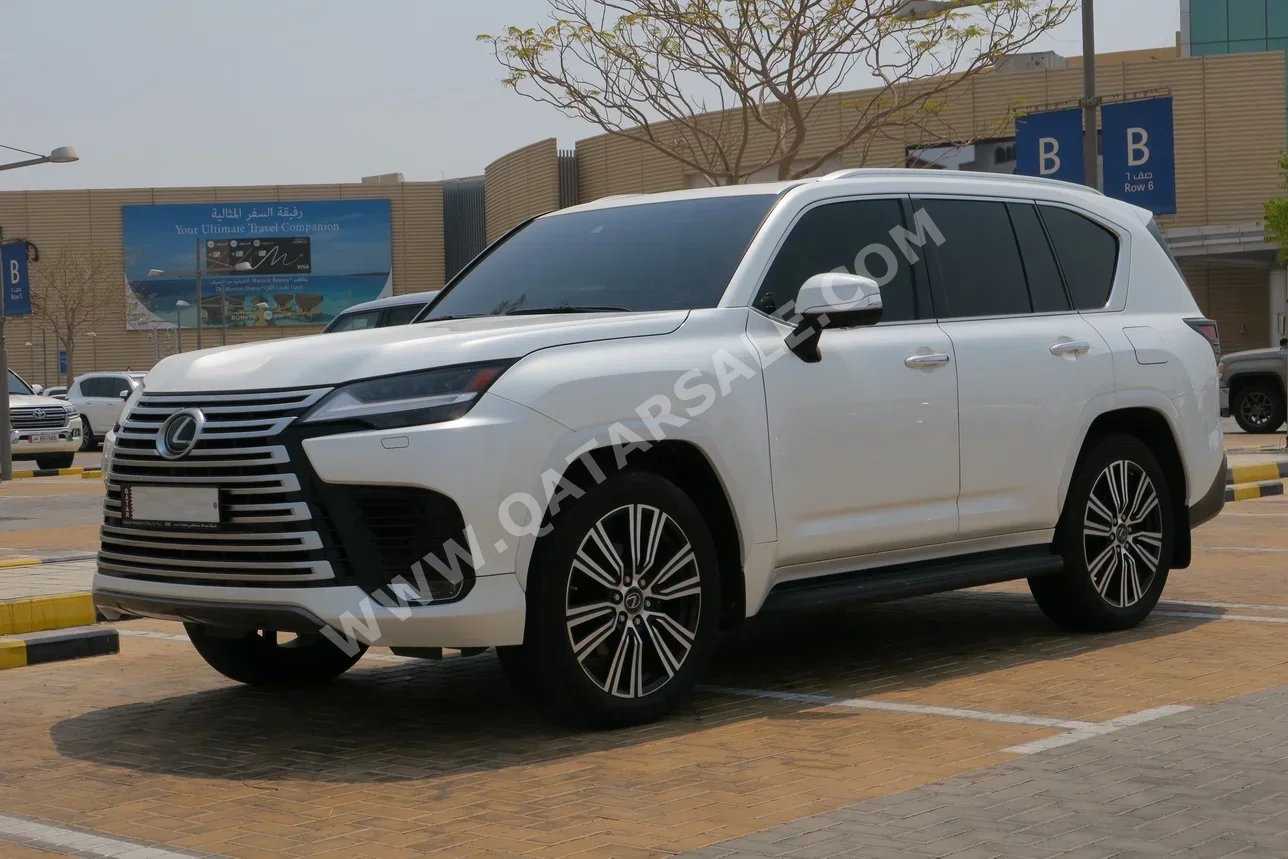 Lexus  LX  600 Luxury  2023  Automatic  59,000 Km  6 Cylinder  Four Wheel Drive (4WD)  SUV  White  With Warranty
