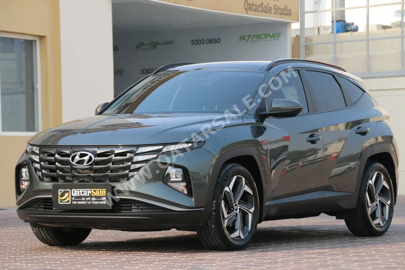 Hyundai  Tucson  Limited  2022  Automatic  41,000 Km  4 Cylinder  Front Wheel Drive (FWD)  SUV  Gray  With Warranty