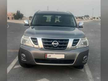 Nissan  Patrol  Platinum  2014  Automatic  76,000 Km  8 Cylinder  Four Wheel Drive (4WD)  SUV  Gray