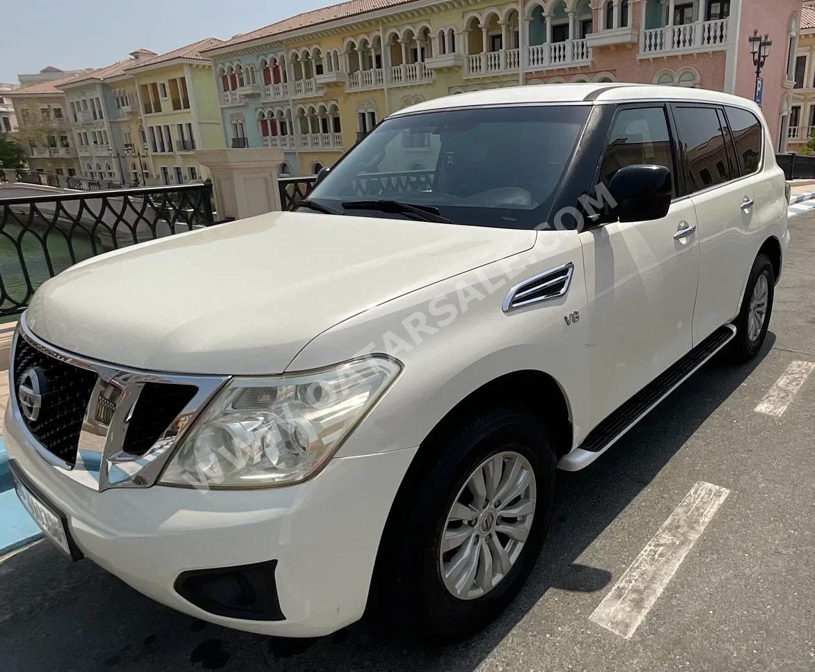 Nissan  Patrol  SE  2016  Automatic  170,764 Km  8 Cylinder  Four Wheel Drive (4WD)  SUV  White