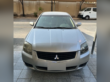ميتسوبيشي  غالانت  2009  اوتوماتيك  350,000 كم  4 سلندر  سحب امامي  سيدان  فضي