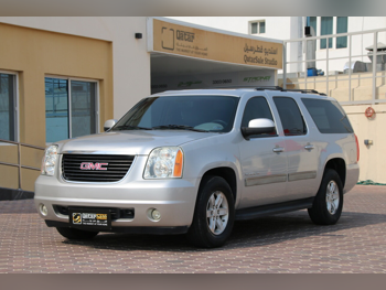 GMC  Yukon  2011  Automatic  242,000 Km  8 Cylinder  Four Wheel Drive (4WD)  SUV  Silver