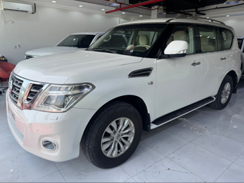 Nissan  Patrol  SE  2015  Automatic  202,000 Km  8 Cylinder  Four Wheel Drive (4WD)  SUV  White