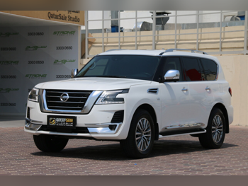 Nissan  Patrol  Platinum  2021  Automatic  31,000 Km  8 Cylinder  Four Wheel Drive (4WD)  SUV  White