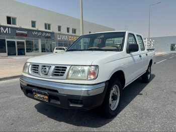 Nissan  Pickup  2003  Manual  136,000 Km  4 Cylinder  Rear Wheel Drive (RWD)  Pick Up  White