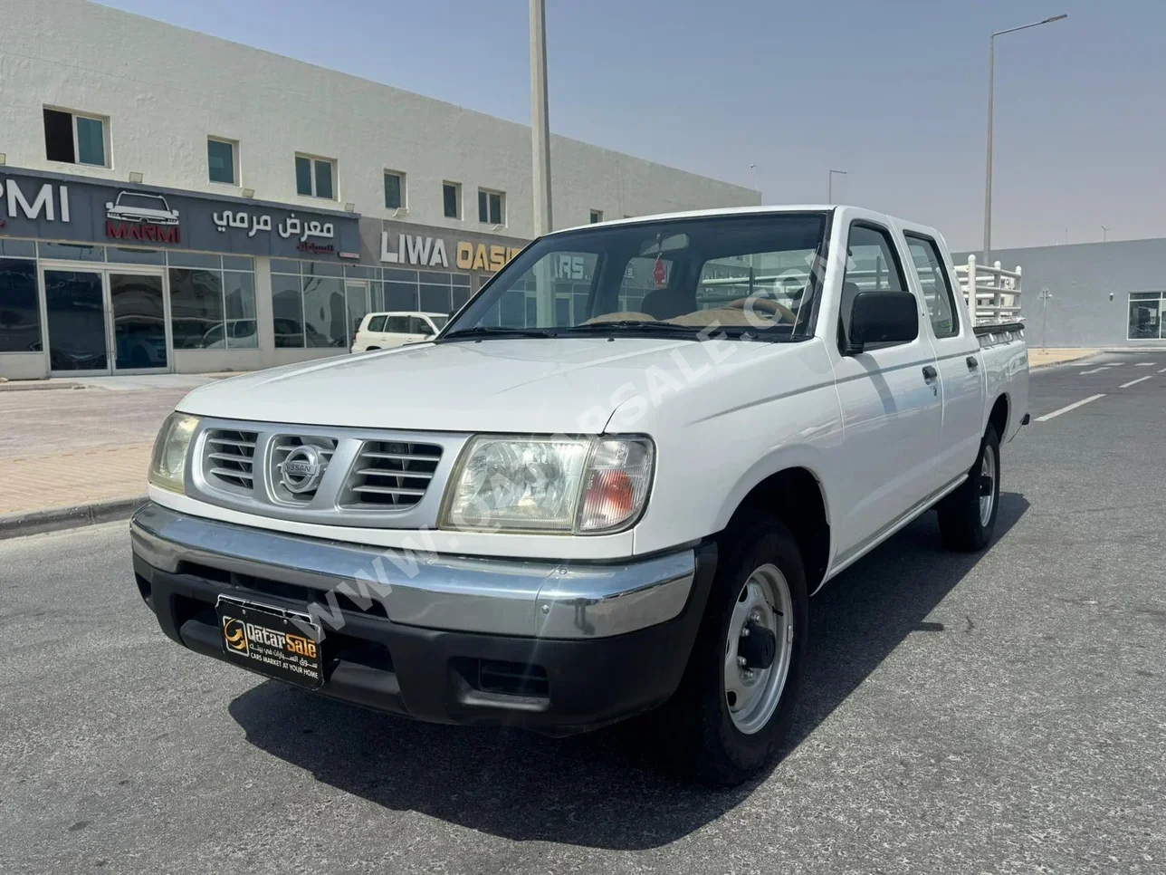 نيسان  بيك أب  2003  عادي  136,000 كم  4 سلندر  دفع خلفي  بيكب  أبيض