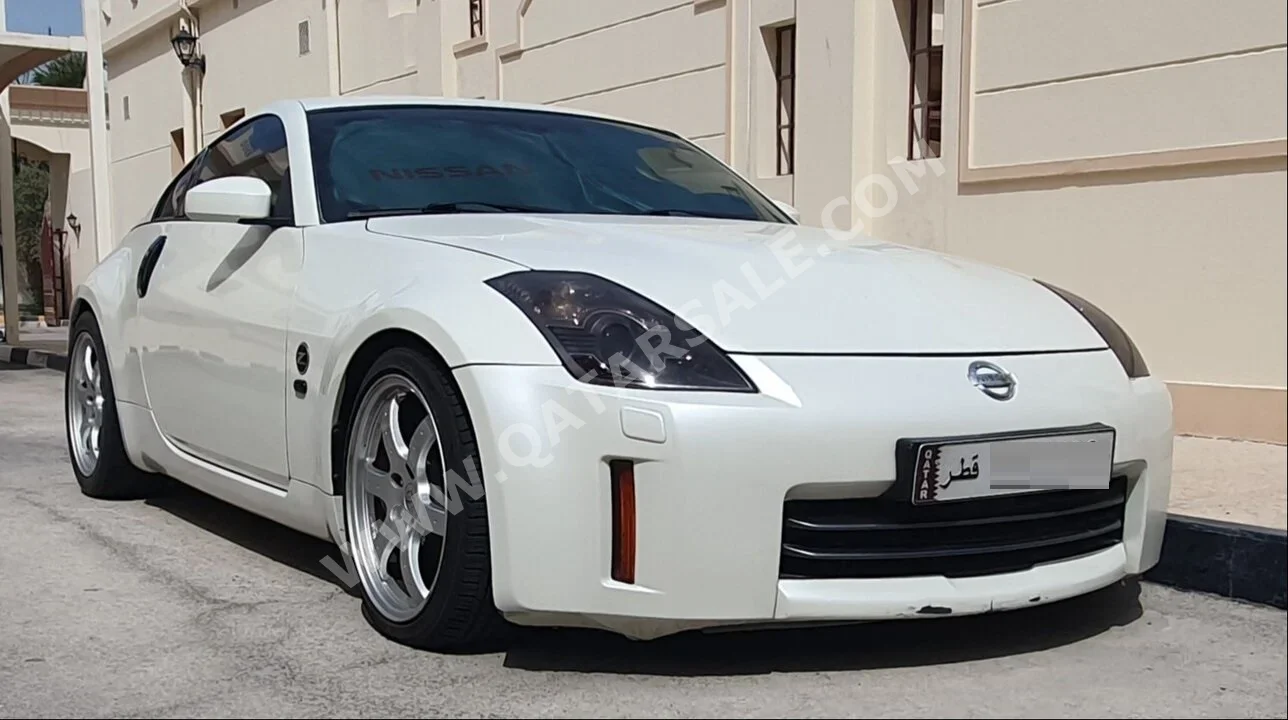 نيسان  زد  350  2009  اوتوماتيك  75,000 كم  6 سلندر  دفع خلفي  كوبيه \ سبورت  أبيض