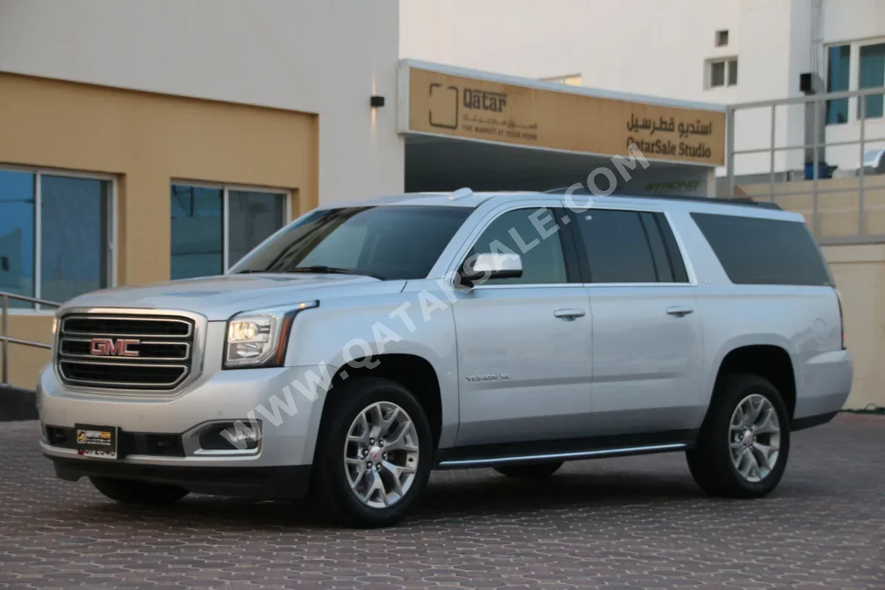 GMC  Yukon  XL SLT  2015  Automatic  39,000 Km  8 Cylinder  Four Wheel Drive (4WD)  SUV  Silver
