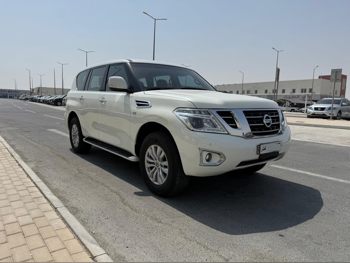 Nissan  Patrol  SE  2014  Automatic  330,000 Km  8 Cylinder  Four Wheel Drive (4WD)  SUV  White
