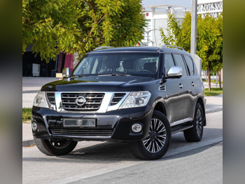 Nissan  Patrol  LE Platinum  2015  Automatic  95,000 Km  8 Cylinder  All Wheel Drive (AWD)  SUV  Black  With Warranty
