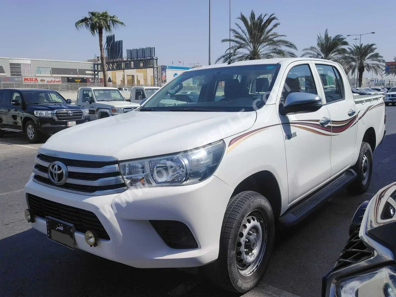 Toyota  Hilux  SR5  2019  Automatic  69,000 Km  4 Cylinder  Four Wheel Drive (4WD)  Pick Up  White