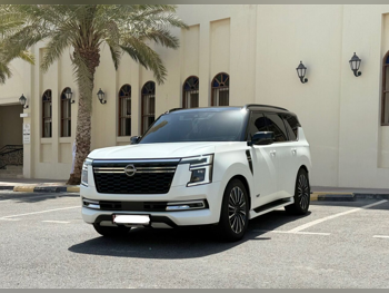 Nissan  Patrol  Platinum  2025  Automatic  12,000 Km  6 Cylinder  Four Wheel Drive (4WD)  SUV  White  With Warranty
