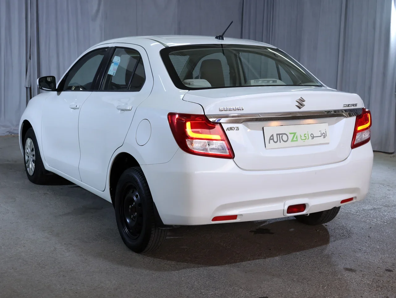 Suzuki  Dzire  2022  Automatic  148,000 Km  4 Cylinder  Front Wheel Drive (FWD)  Sedan  White