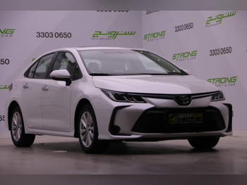 Toyota  Corolla  2024  Automatic  50,000 Km  4 Cylinder  Front Wheel Drive (FWD)  Sedan  Pearl  With Warranty