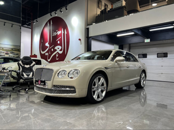 Bentley  Continental  Flying Spur  2014  Automatic  86,000 Km  12 Cylinder  All Wheel Drive (AWD)  Sedan  Gold