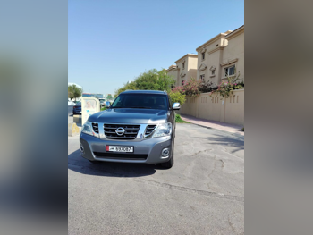 Nissan  Patrol  Platinum  2015  Automatic  129,000 Km  8 Cylinder  Four Wheel Drive (4WD)  SUV  Gray