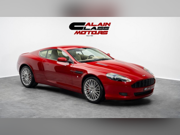 Aston Martin  DB  9  2009  Automatic  185 Km  12 Cylinder  Rear Wheel Drive (RWD)  Coupe / Sport  Red