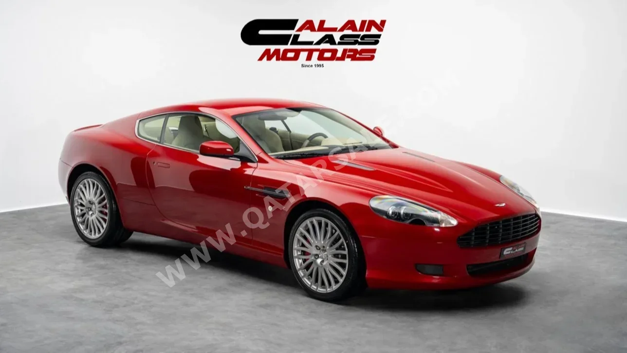 أستون مارتن  دي بي  9  2009  اوتوماتيك  185 كم  12 سلندر  دفع خلفي  كوبيه \ سبورت  أحمر